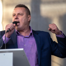 Sorosovo jméno zaznívá i na demonstracích pořádaných Jindřichem Rajchlem